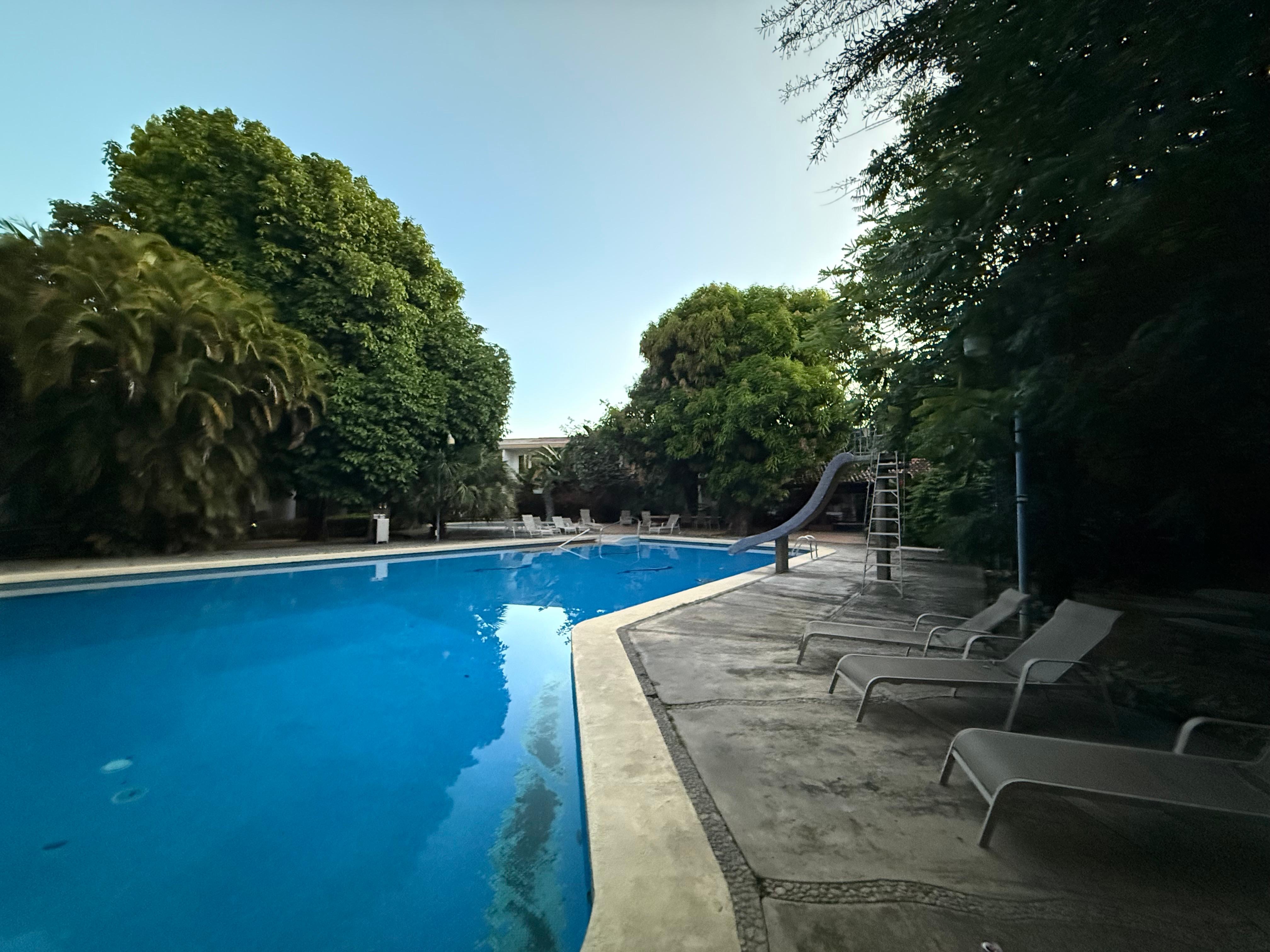 Very nice swimming pool with space between guests.