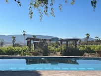 Relaxing by the pool with a serene view