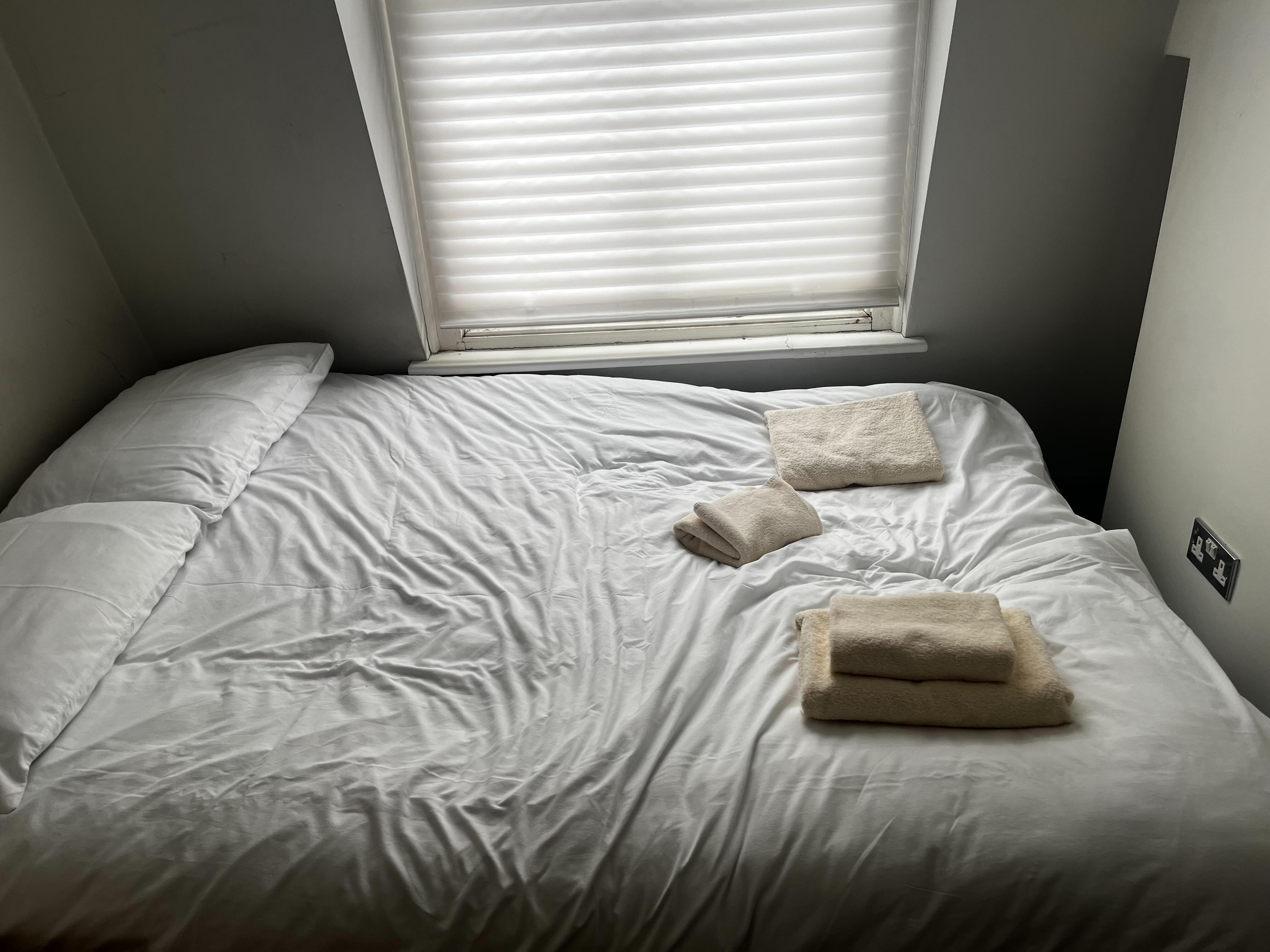 Bed divot; radiator is buried by the bed (its under the window!)