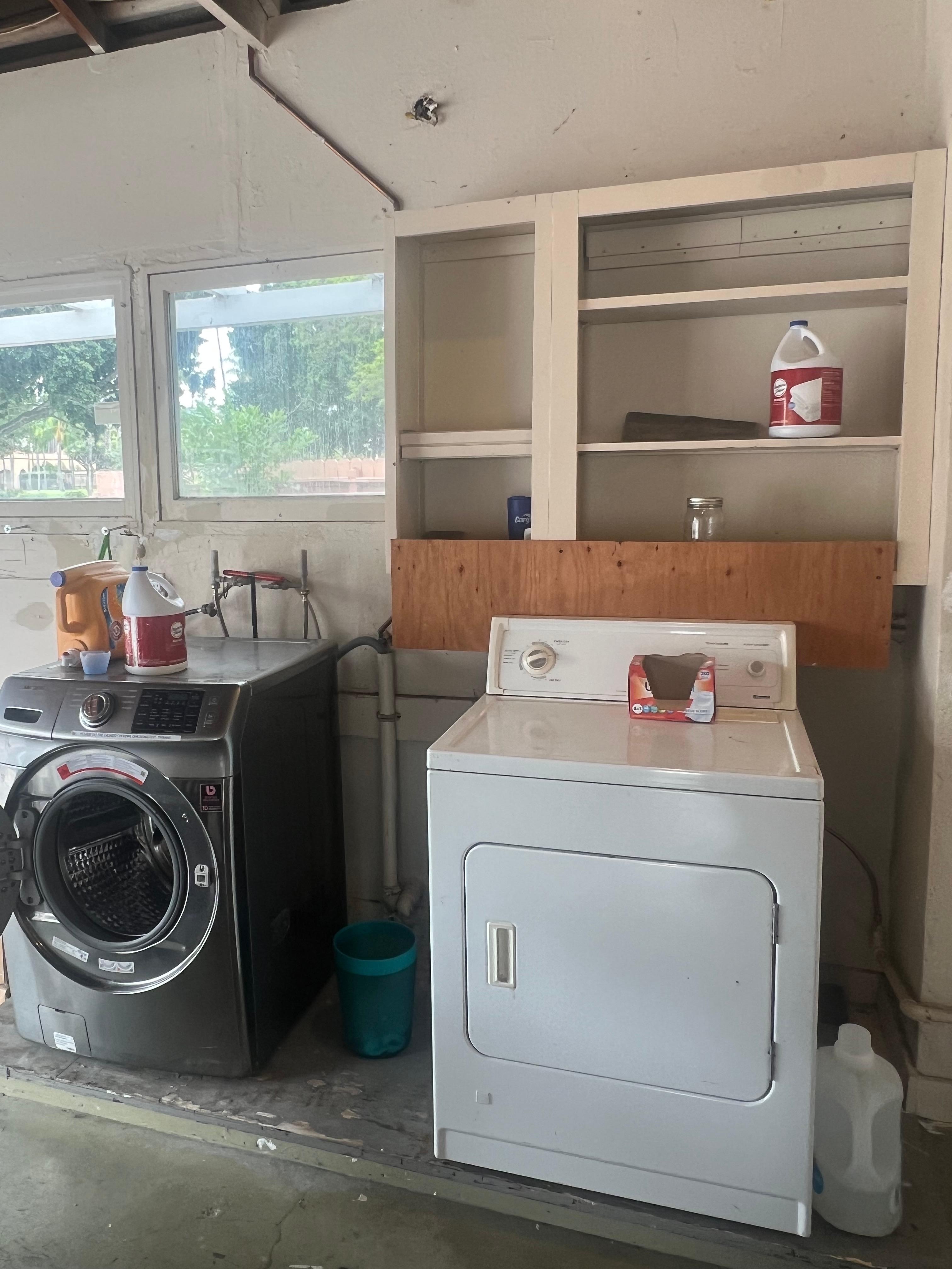 Actual laundry room in garage. 