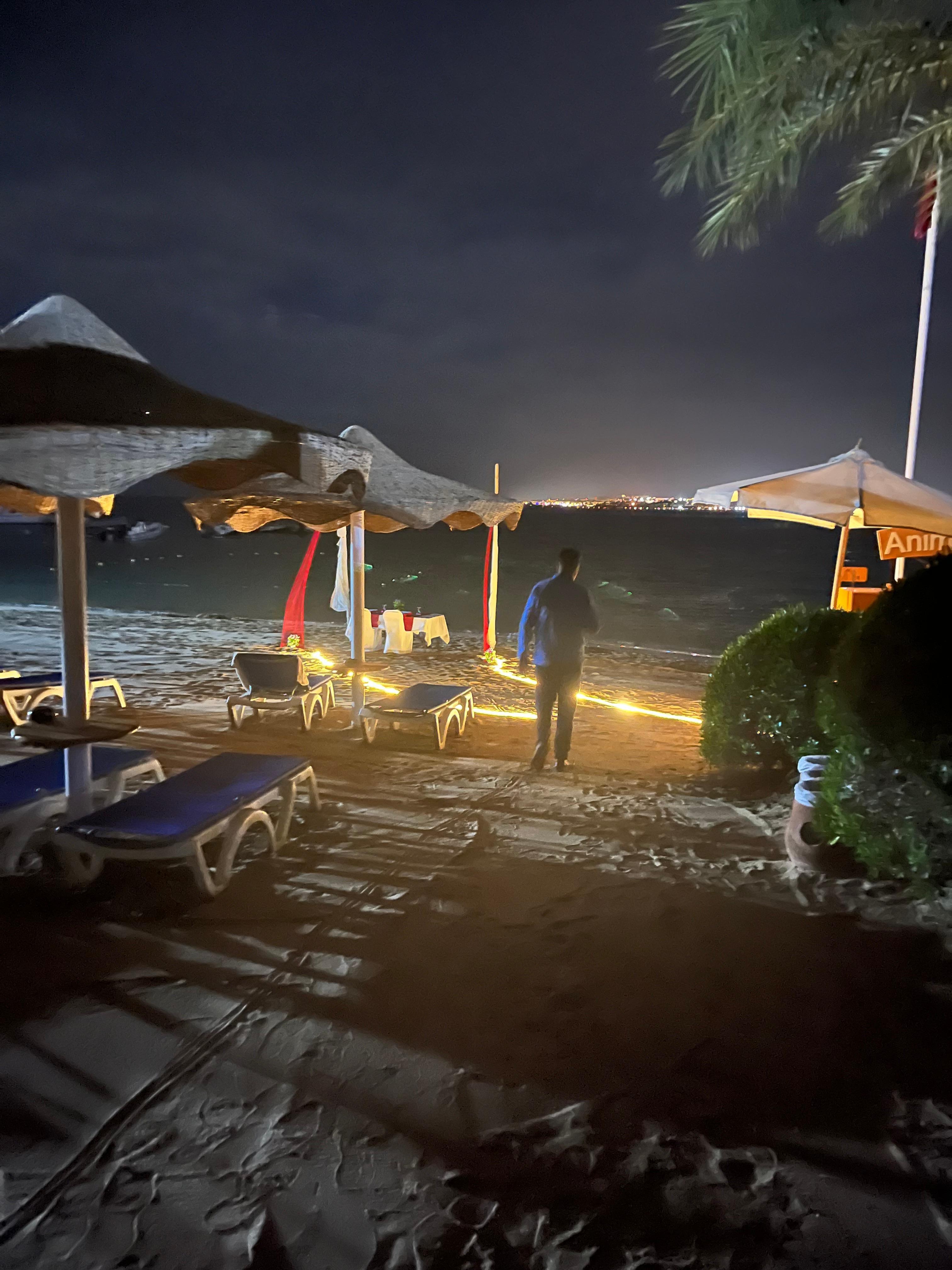 Romantic dinner on the beach. 