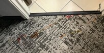 I don’t know what the red stains were outside the bathroom. I did report to the front desk. The manager was concerned and said he would contact housekeeper.