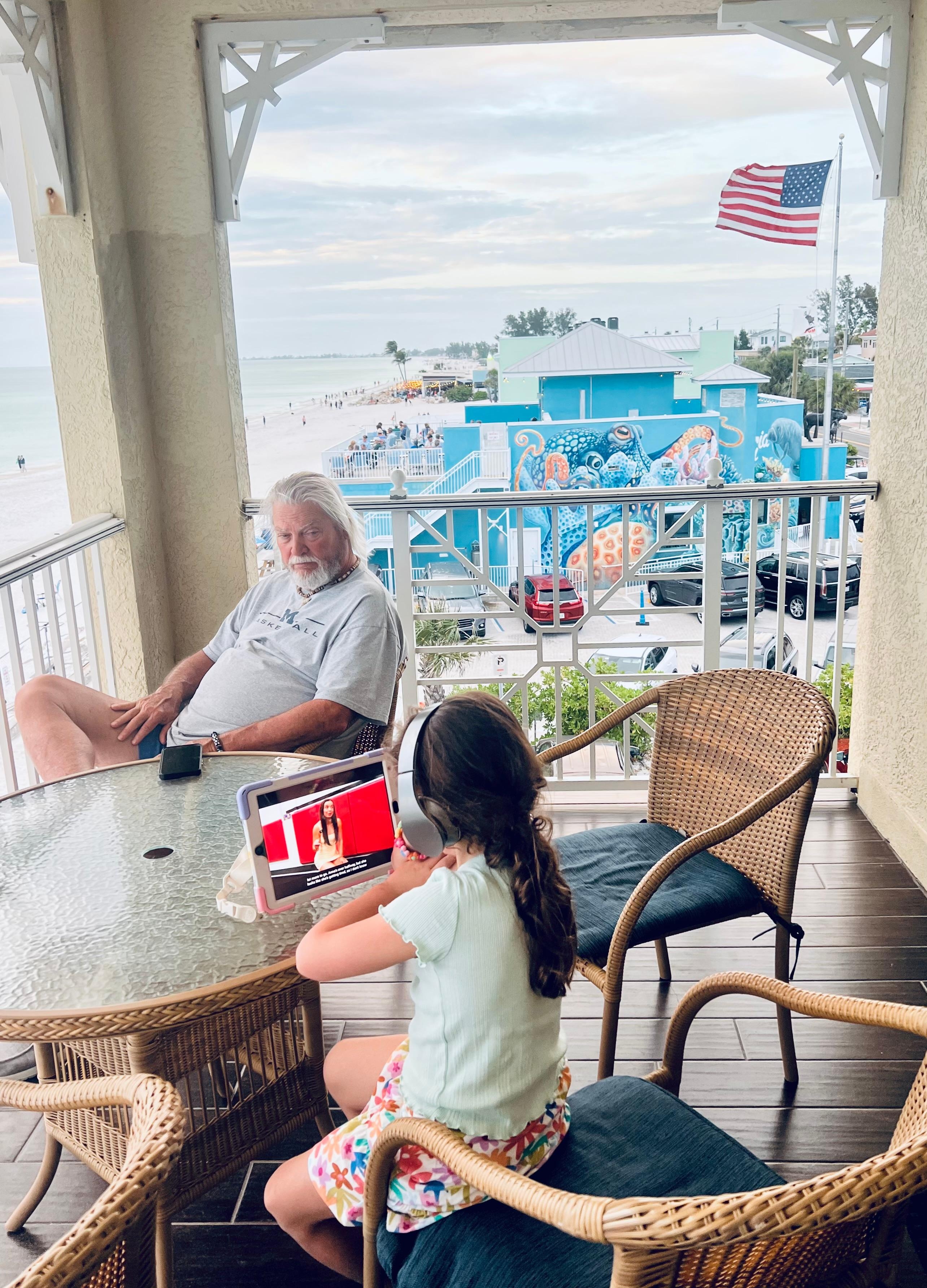 Watch everyone coming and going, you will be in the middle of everything, but 2 flights up.