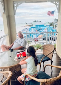 Watch everyone coming and going, you will be in the middle of everything, but 2 flights up.