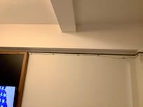 Cabling can be seen as it’s tacked to the wall. This room needs to be updated!