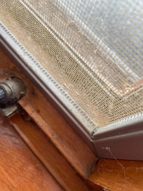 Every window was full of webs, dirt and dust.
