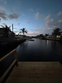 Looking down the canal from the dock at evening time.