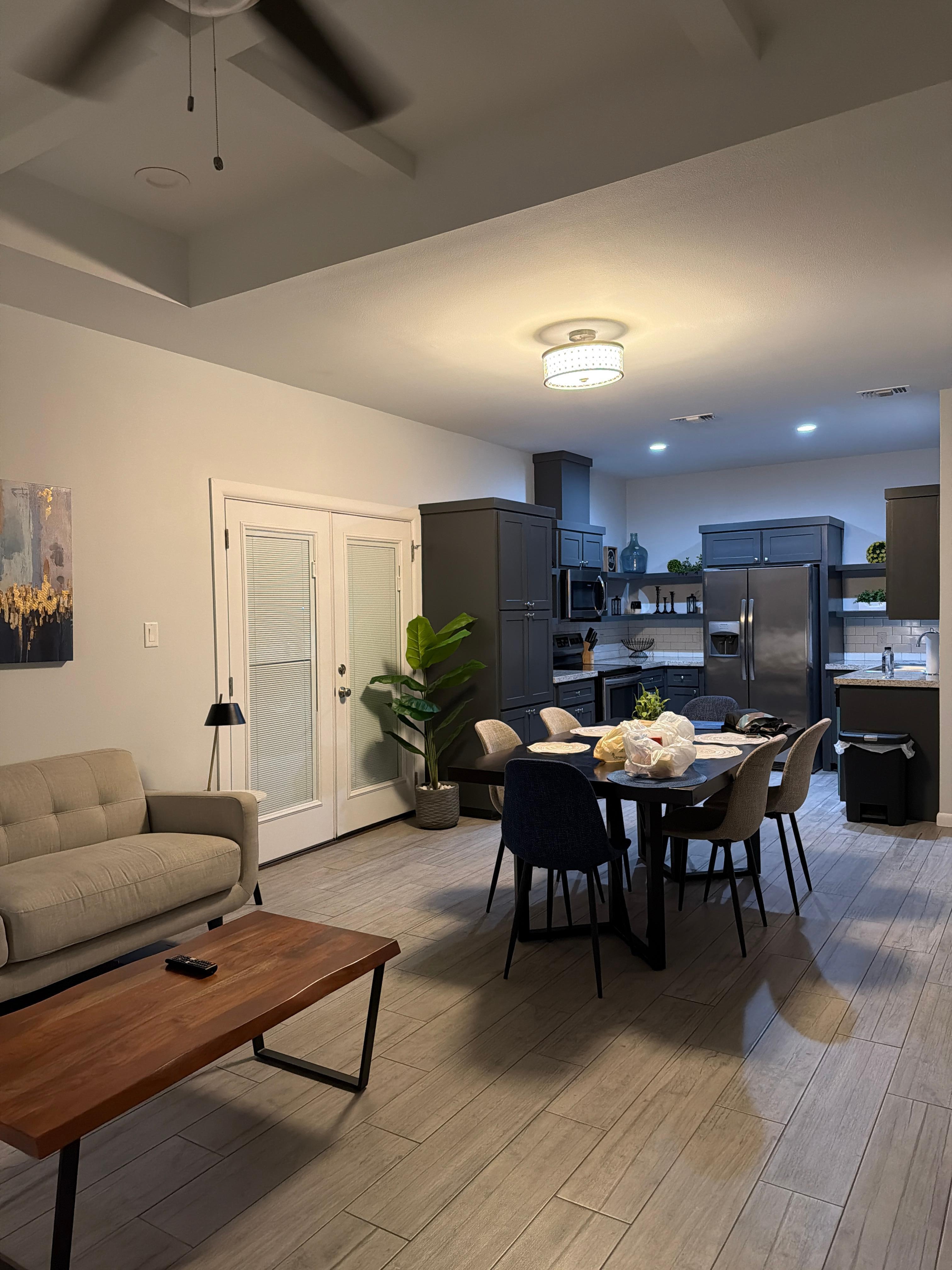 Large open living, dining and kitchen area. 