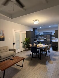 Large open living, dining and kitchen area.