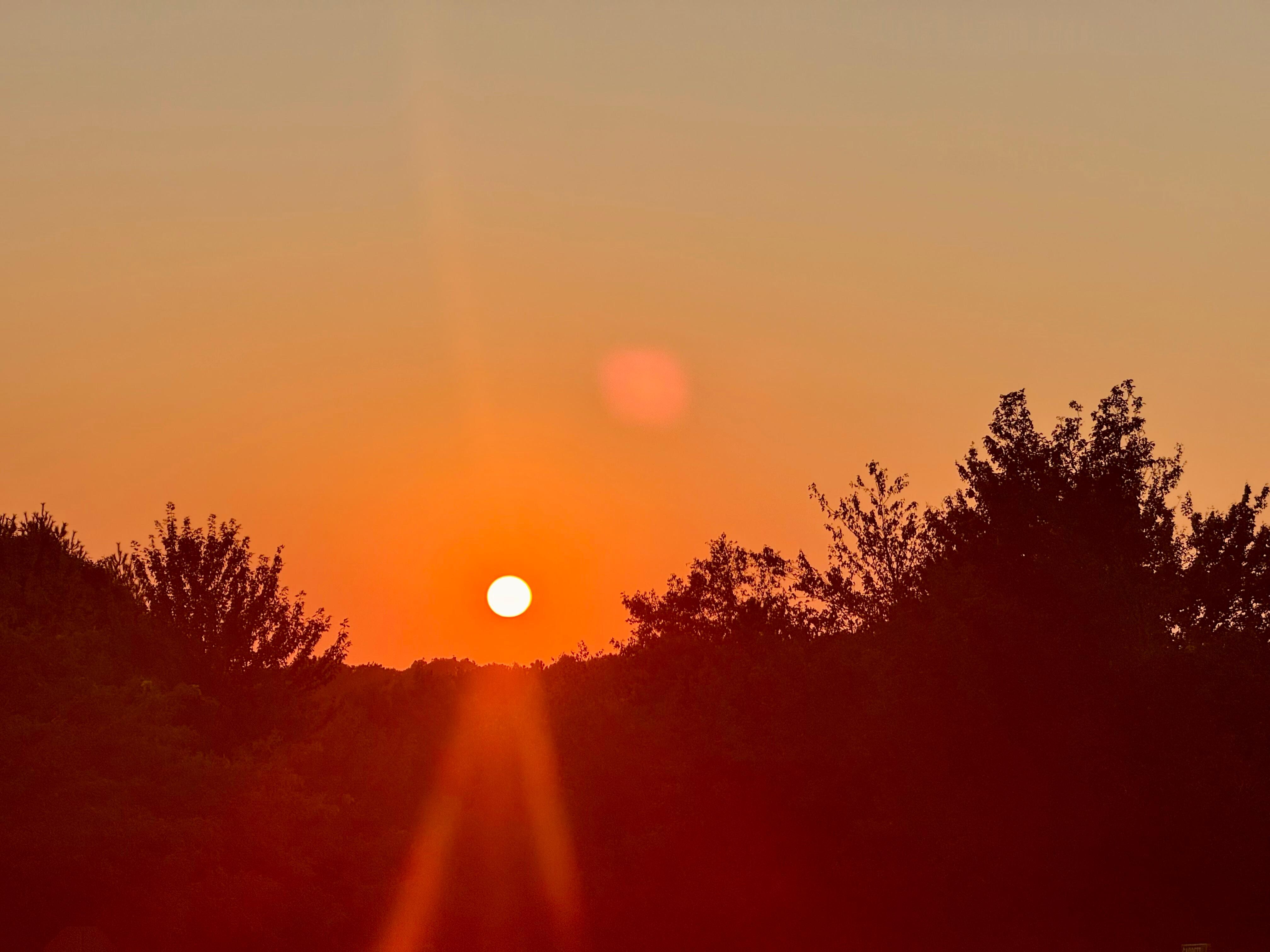 Beautiful sunset outside the front door of house