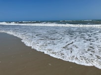 Pretty beach in front of the house