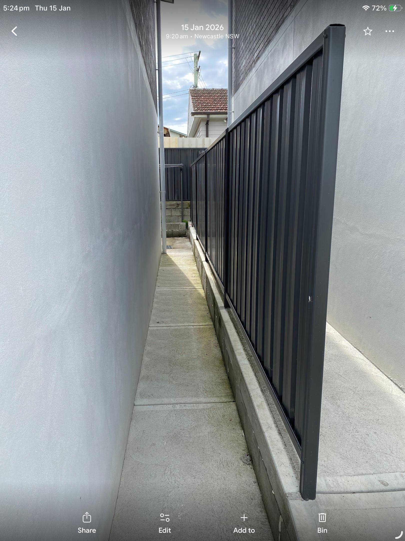 Side access to backyard with no gate.