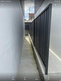 Side access to backyard with no gate.