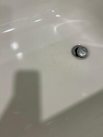 Some brown streaks in the tub.