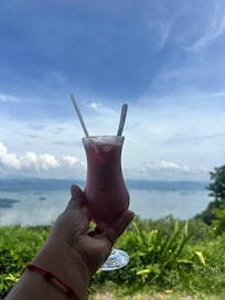 Canada drink at the restaurant and view of lake Ilopango.