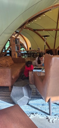 The lobby has games and books and plenty of places to relax. There is also beautiful outdoor seating for smores and gathering including some nightly singings.