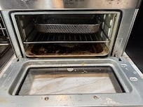 Toaster oven-so filthy that it could not be used.