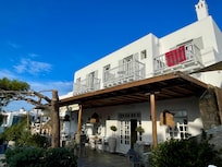Hotel main entrance with lovely places to sit out front