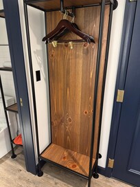 The closet with 5 hangers