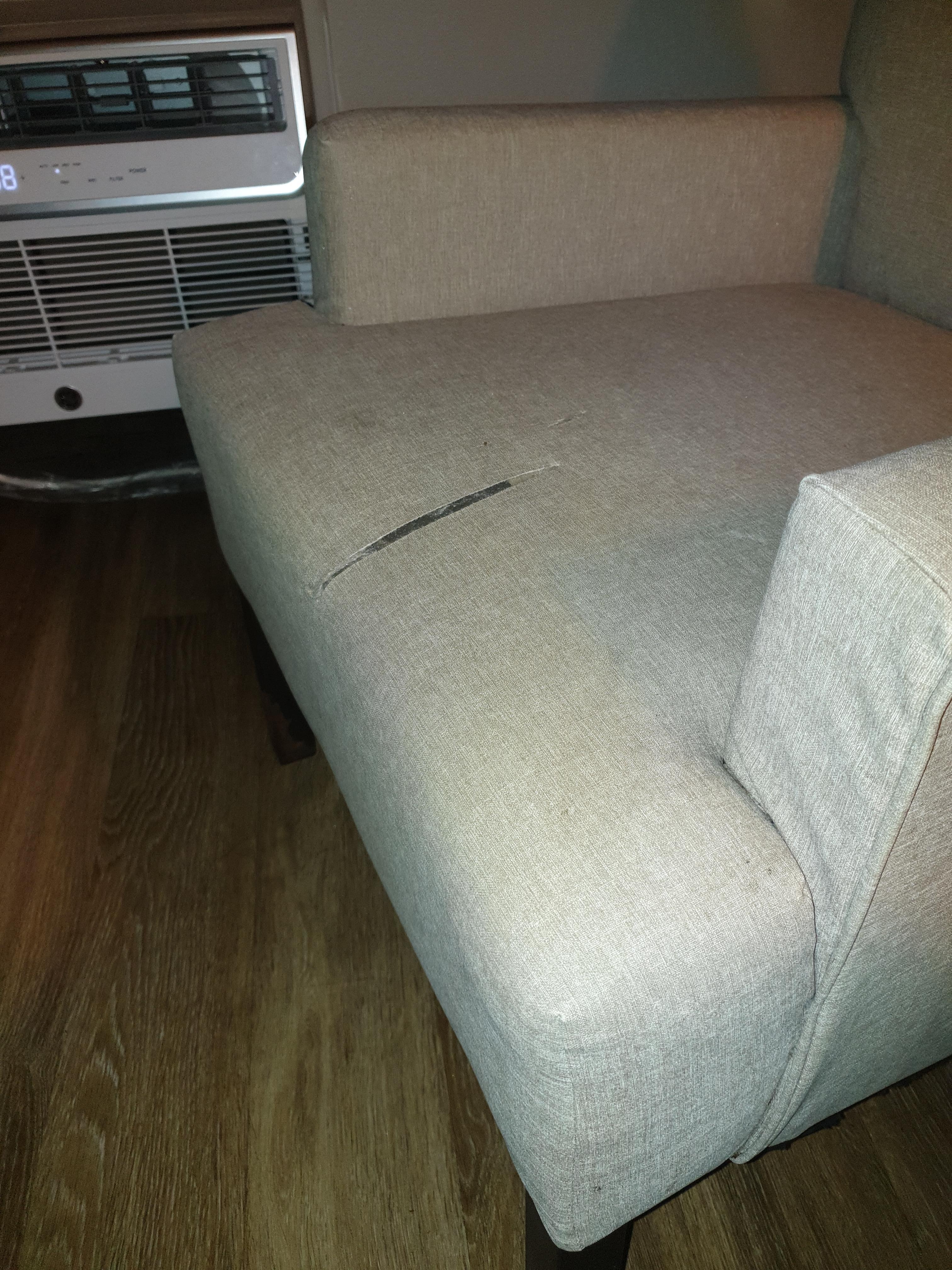 Prior guest failed to read the sign "Please don,t sit on couch with switch-blade in pocket"