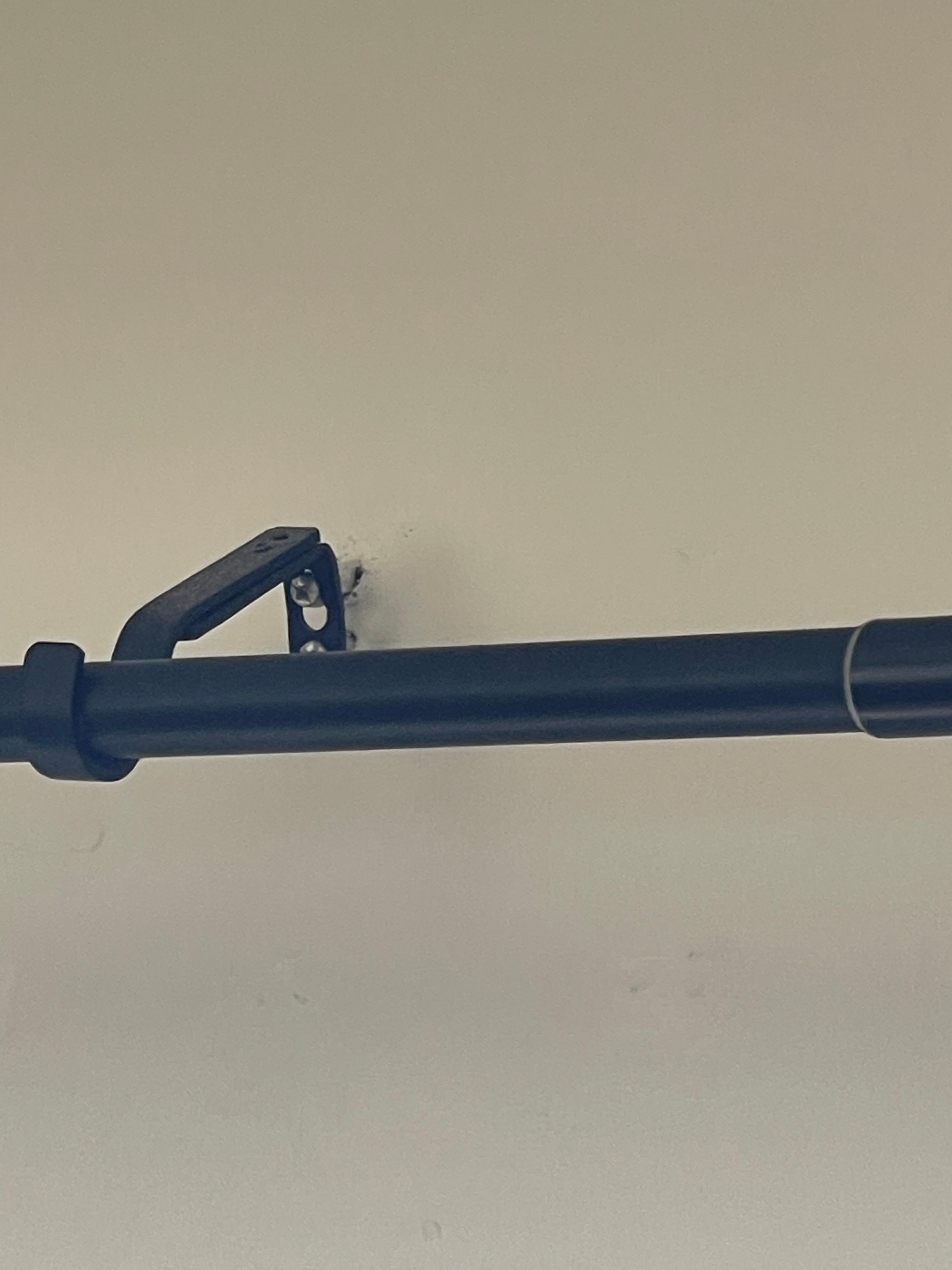 Curtains rod starting to pull away from wall.