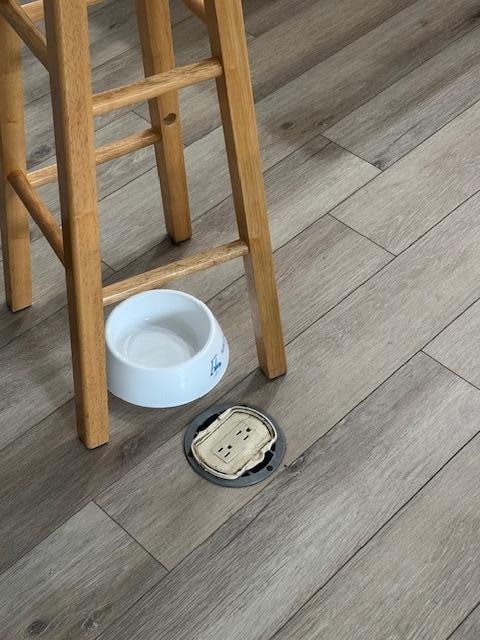 electrical outlet not flush to floor or covered - tripping hazard