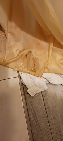 Shower curtain with black stain( mold?)