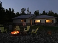 Fire pit and house at night