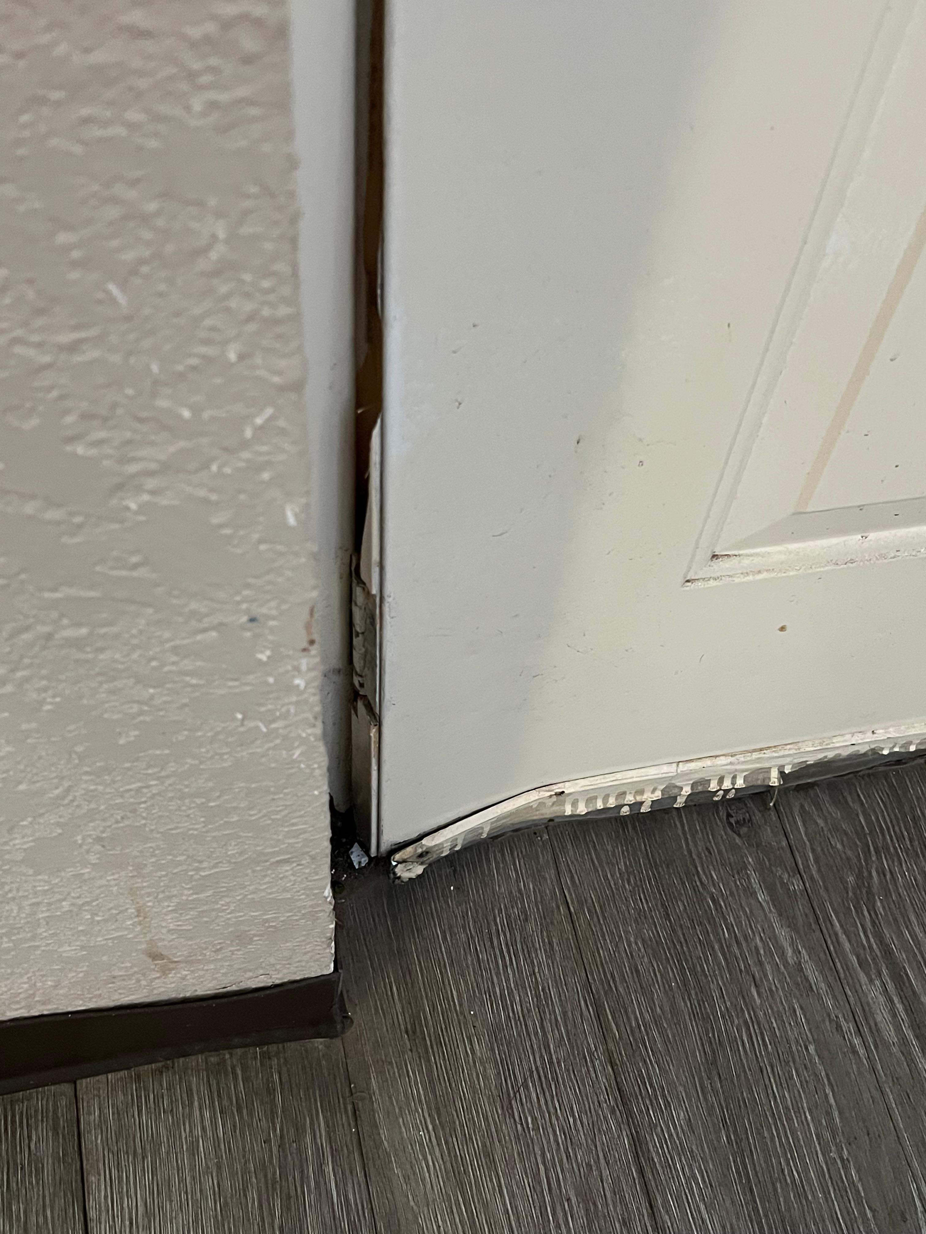 Door bent with no bottom hinge and does not seal