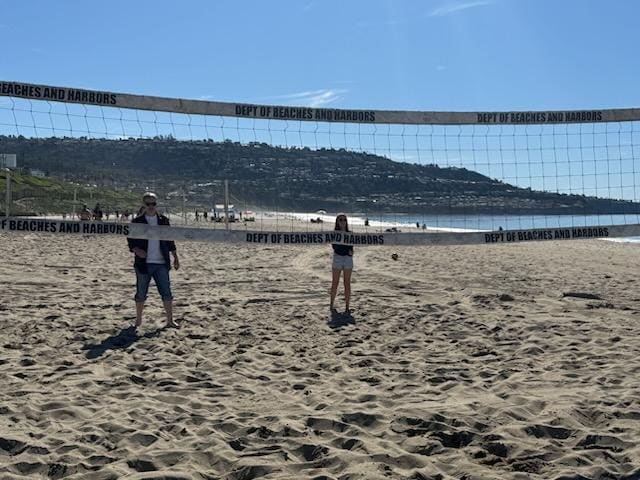 Volleyball on the beach.  Sports equipment provided by host. 