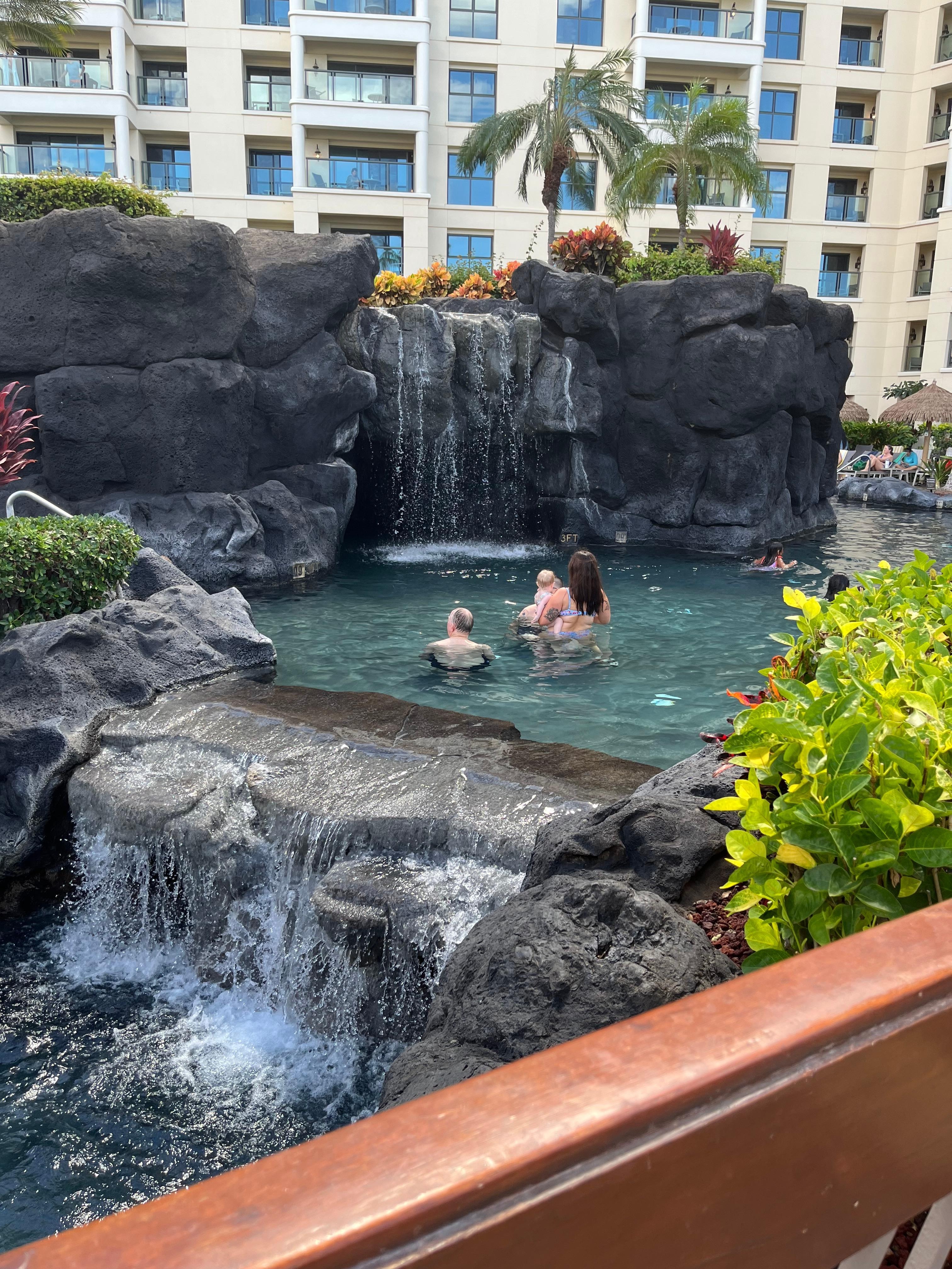 Pool with waterfall and slide for kids