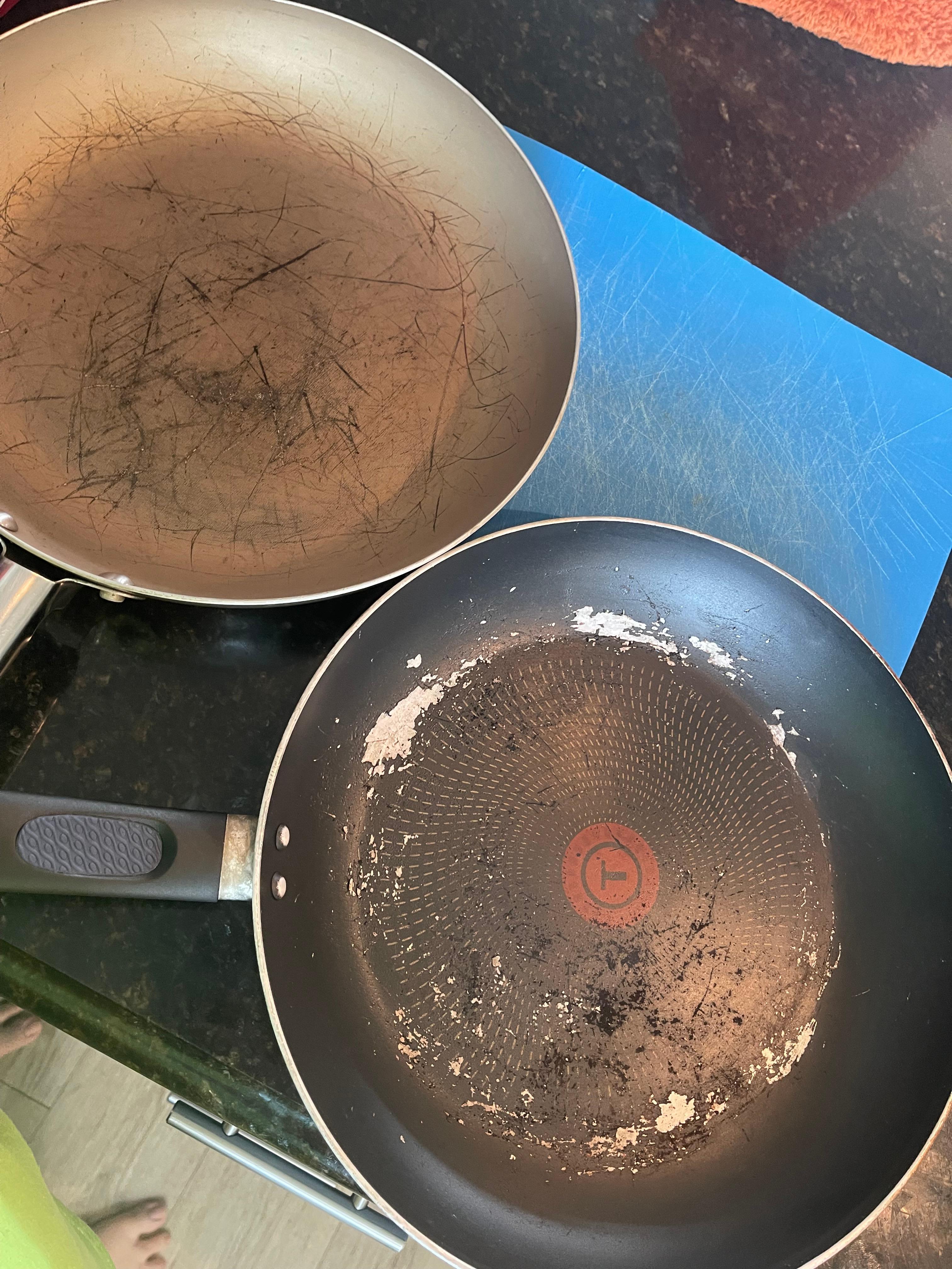 Scratched and burnt on food that did not come off. 