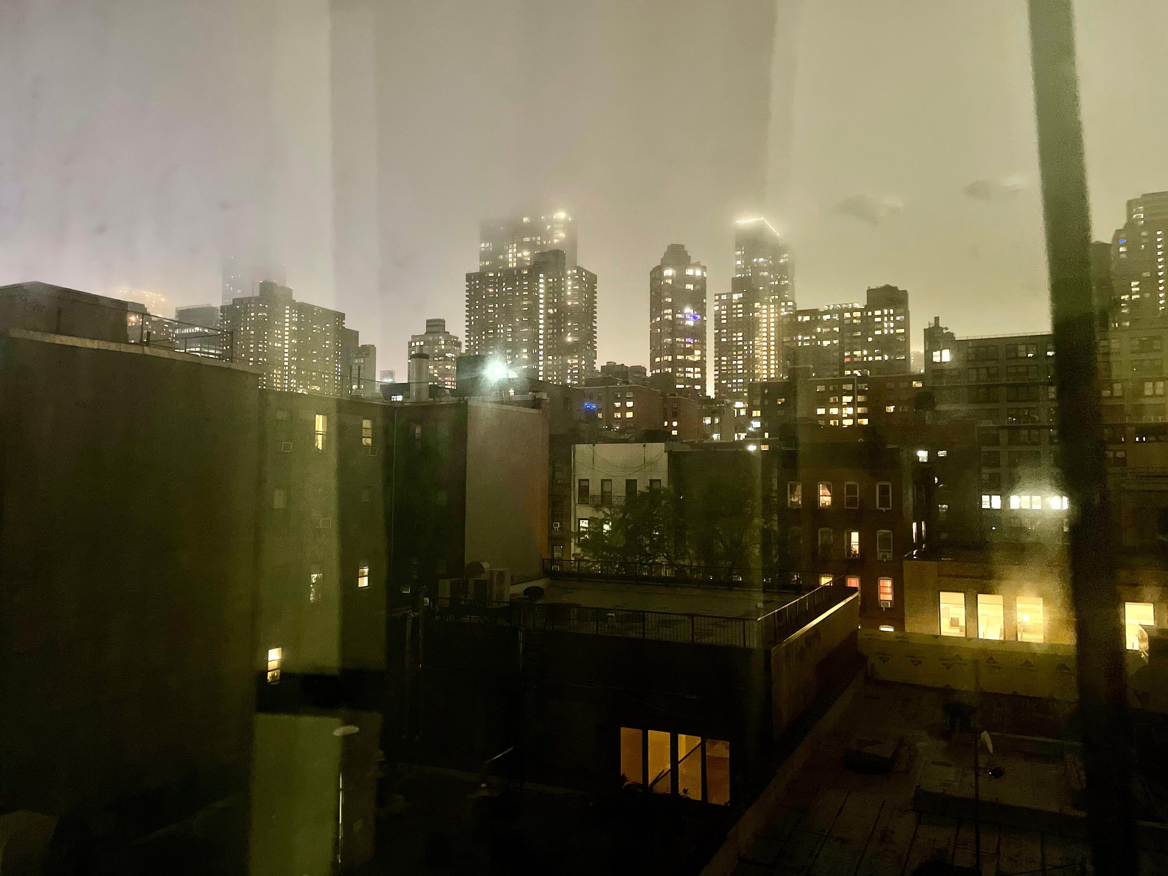 Looking out the window of my room.