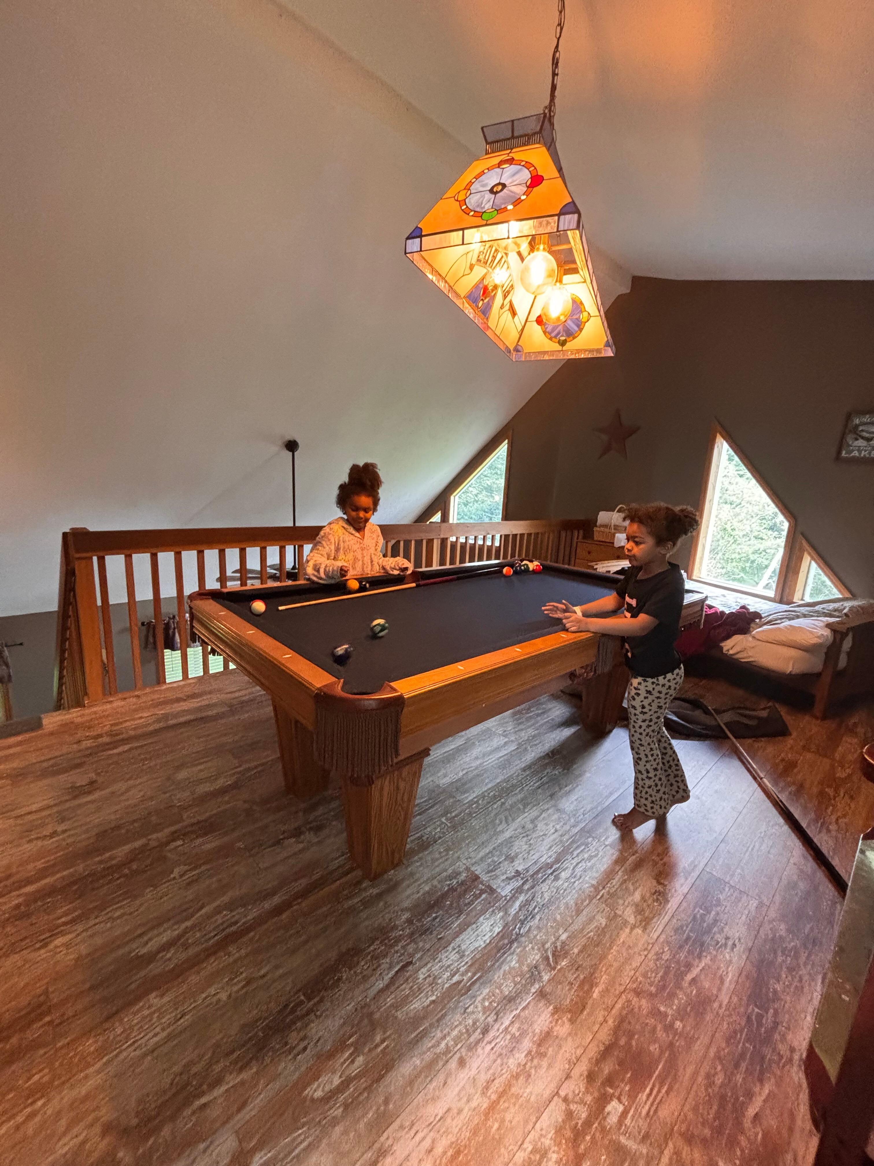 Pool table, toys & games to keep little  ones busy. 