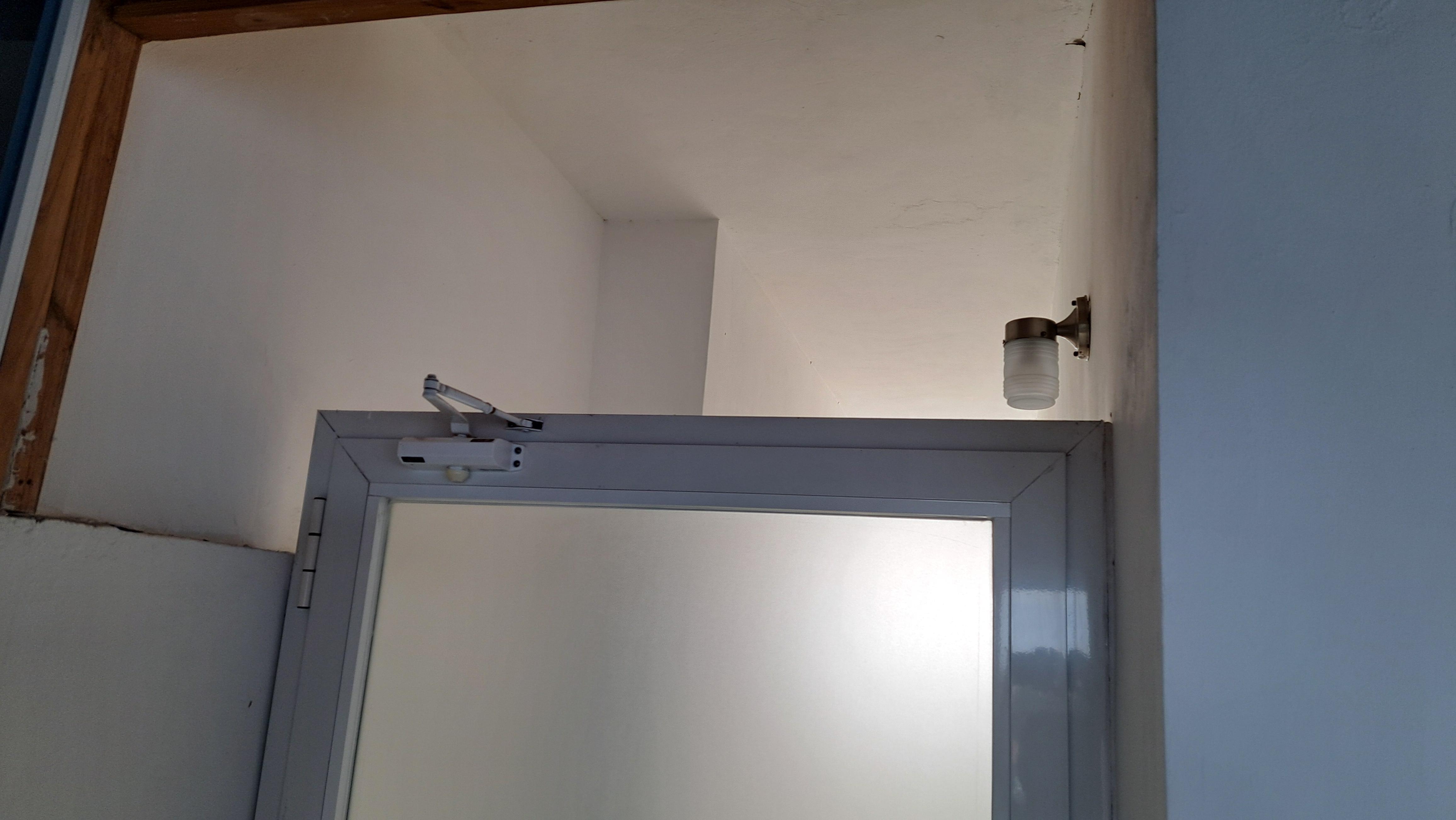 No wall above door in stair well, mosquitoes,  construction noise and neighbour's on  balconies...all day, all night