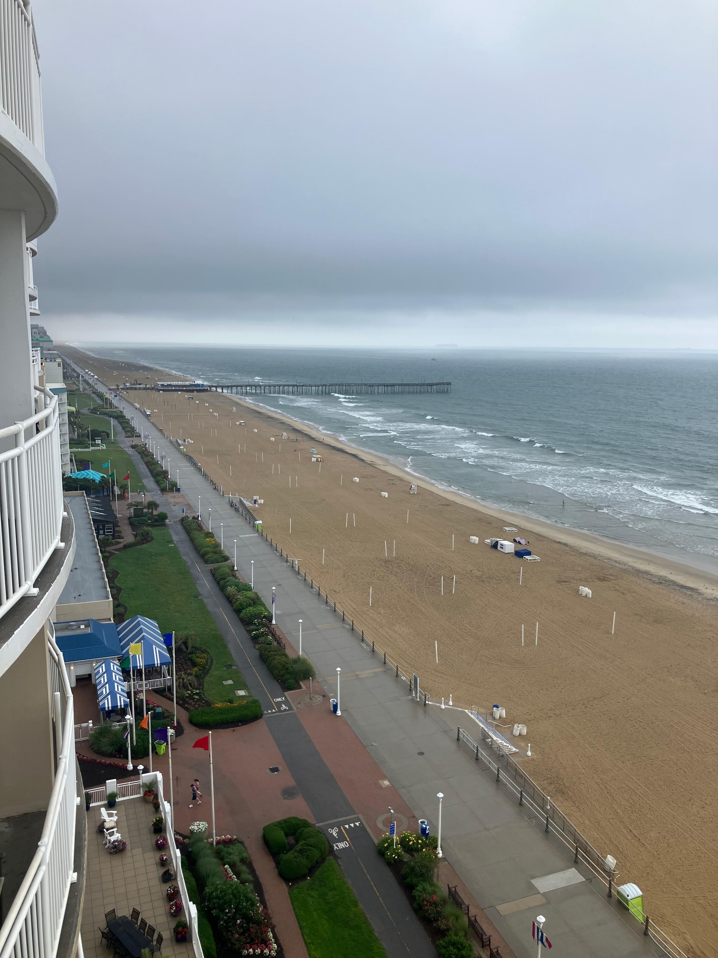 View of boardwalk and beach from balcony.
