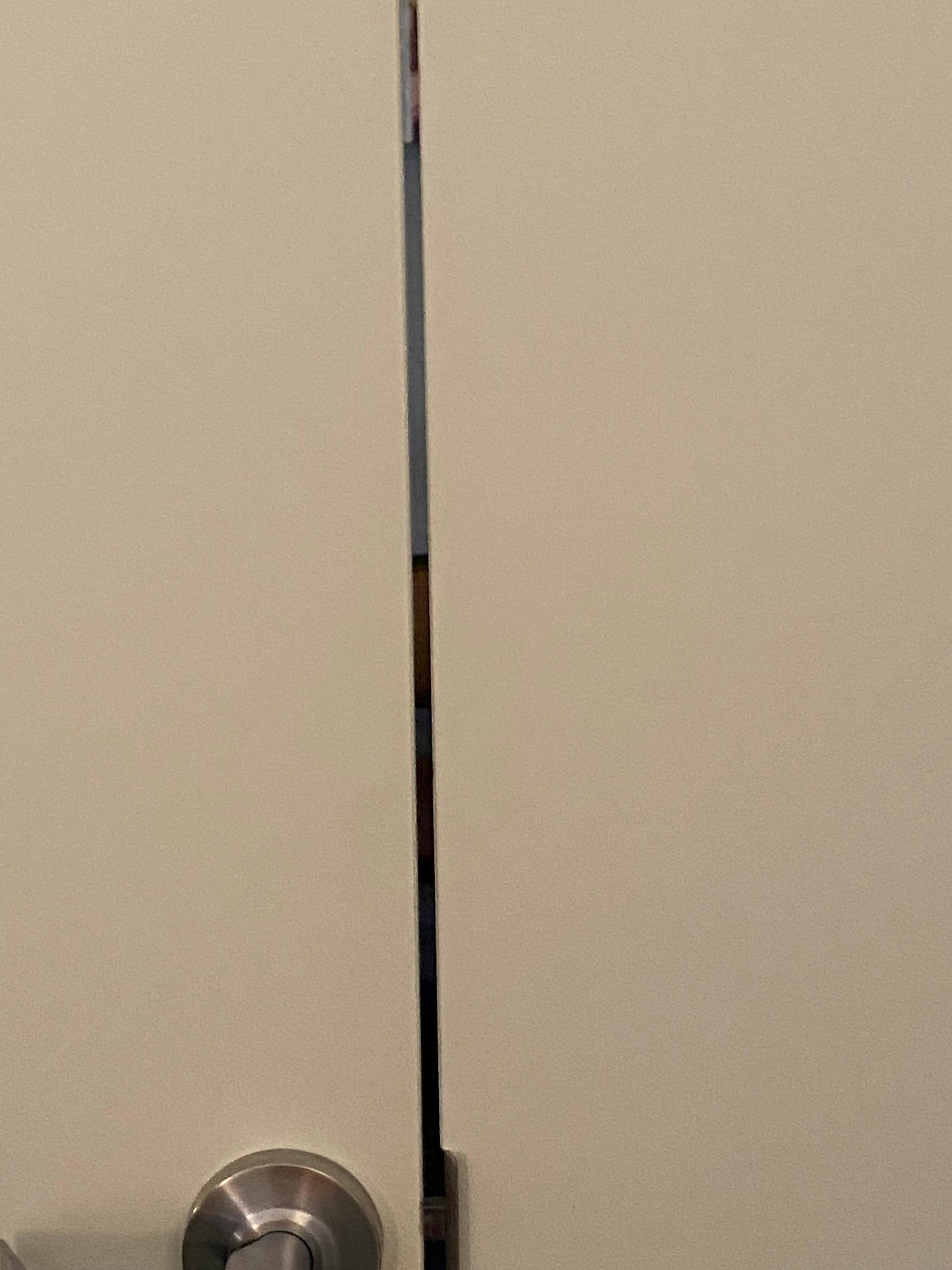 Huge gap in door could see right in bedroom