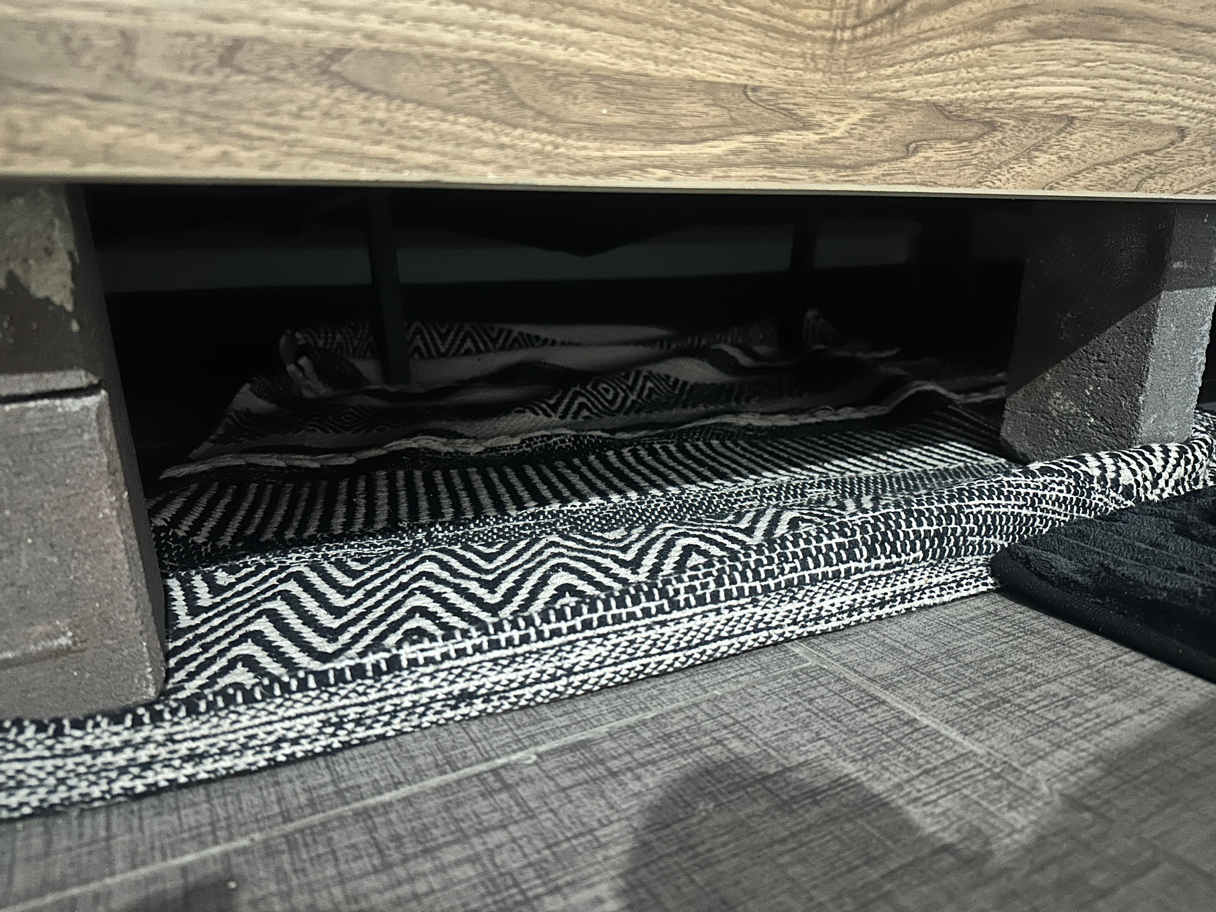 Bricks used to hold up broken box spring 