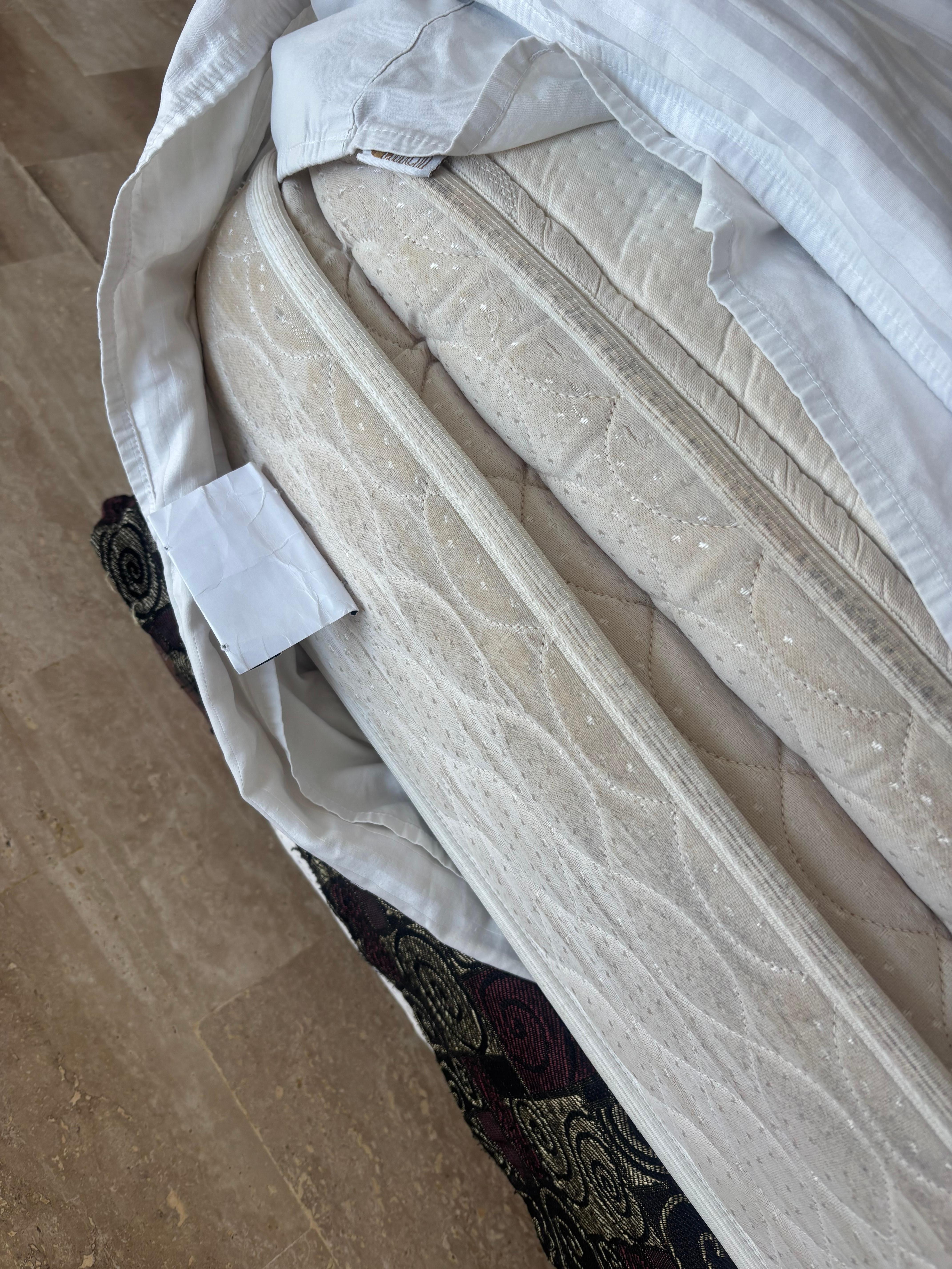 Mattress is dirty and soiled.