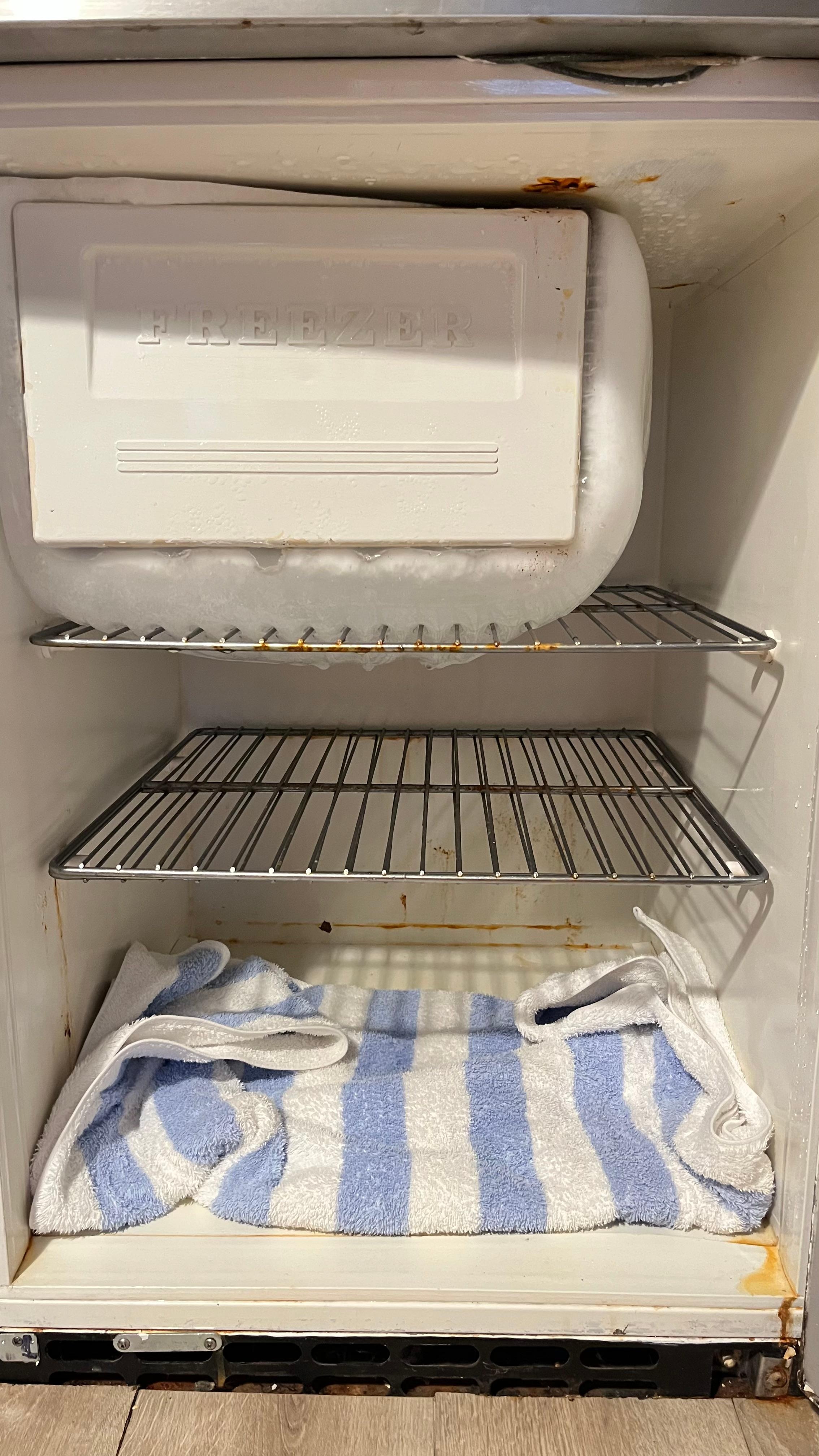 Iced over, rusty fridge in the studio, making the whole room smell like mold. Took 4 days to thaw out the fridge. Unusable.