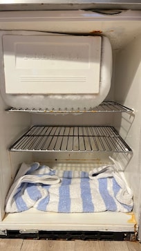 Iced over, rusty fridge in the studio, making the whole room smell like mold. Took 4 days to thaw out the fridge. Unusable.