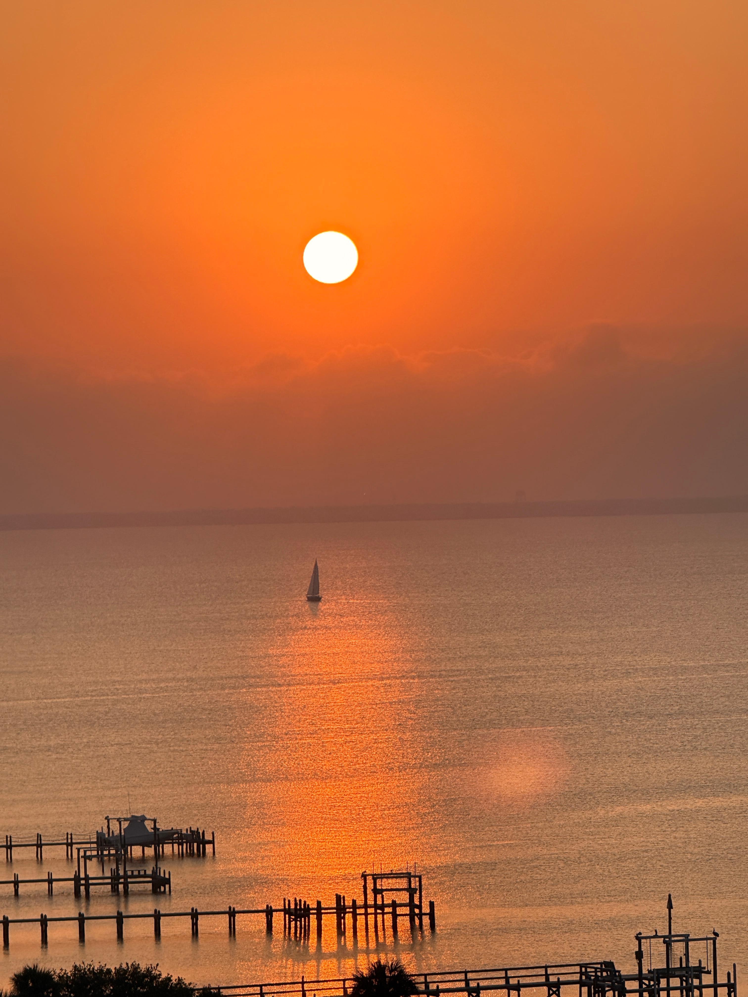 Sunset from rear balcony overlooking the bay.