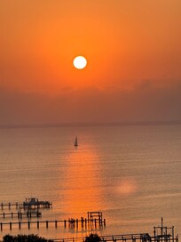 Sunset from rear balcony overlooking the bay.