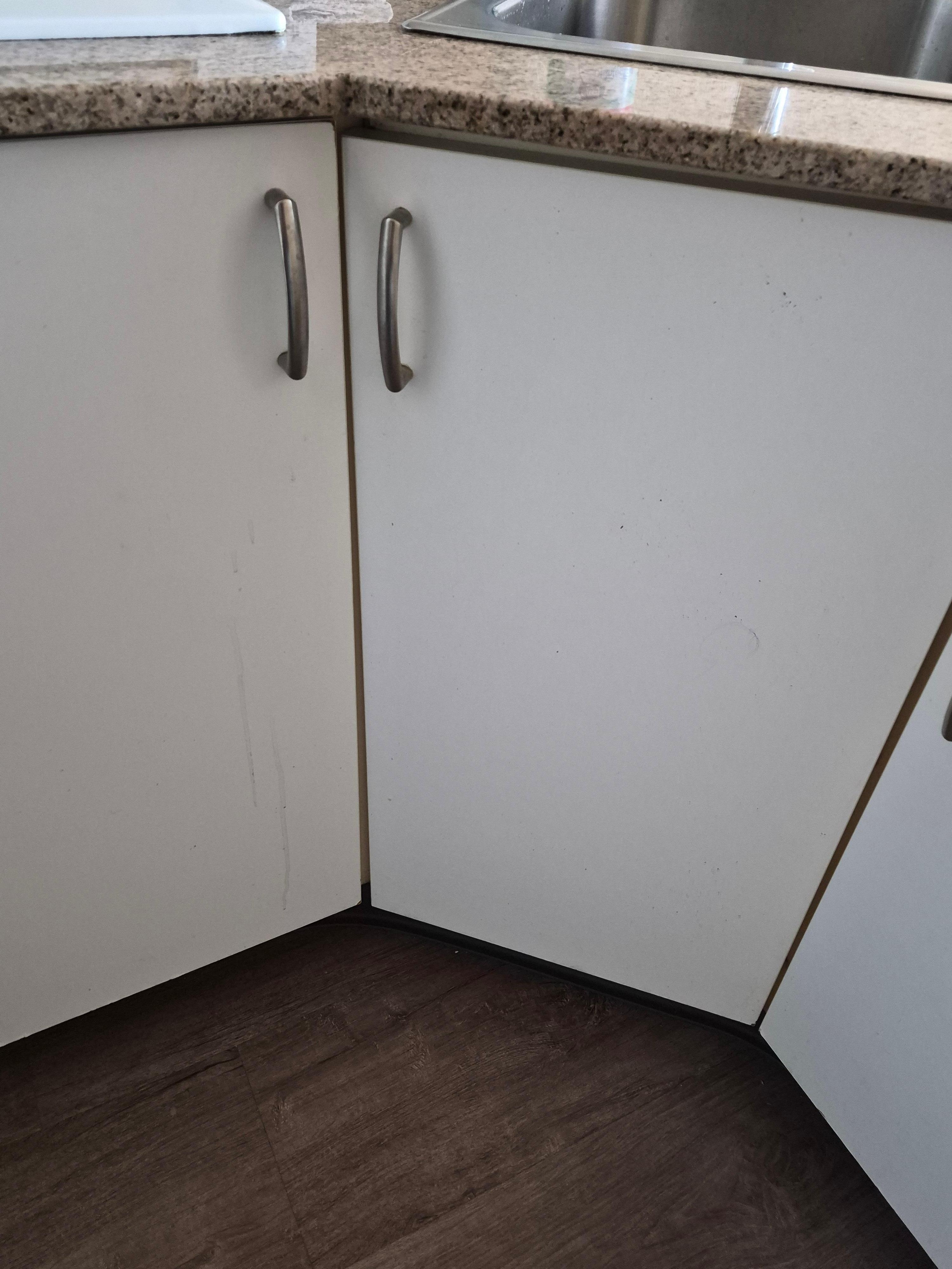 Old spills and hair on the cabinet 