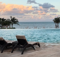 Sunset at Sensira Resort pool ( and ocean)