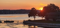 Sunset over the bay from our balcony.
