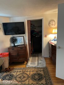 Quirky and homey bedroom. Reminded me of staying at my grandmas.