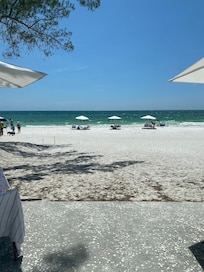 Steps to your included umbrella and chairs