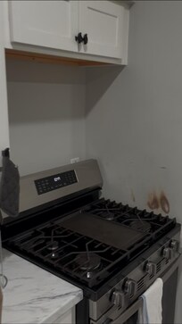 Burn marks on stove wall