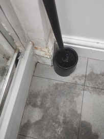 Dirty skirting and shower